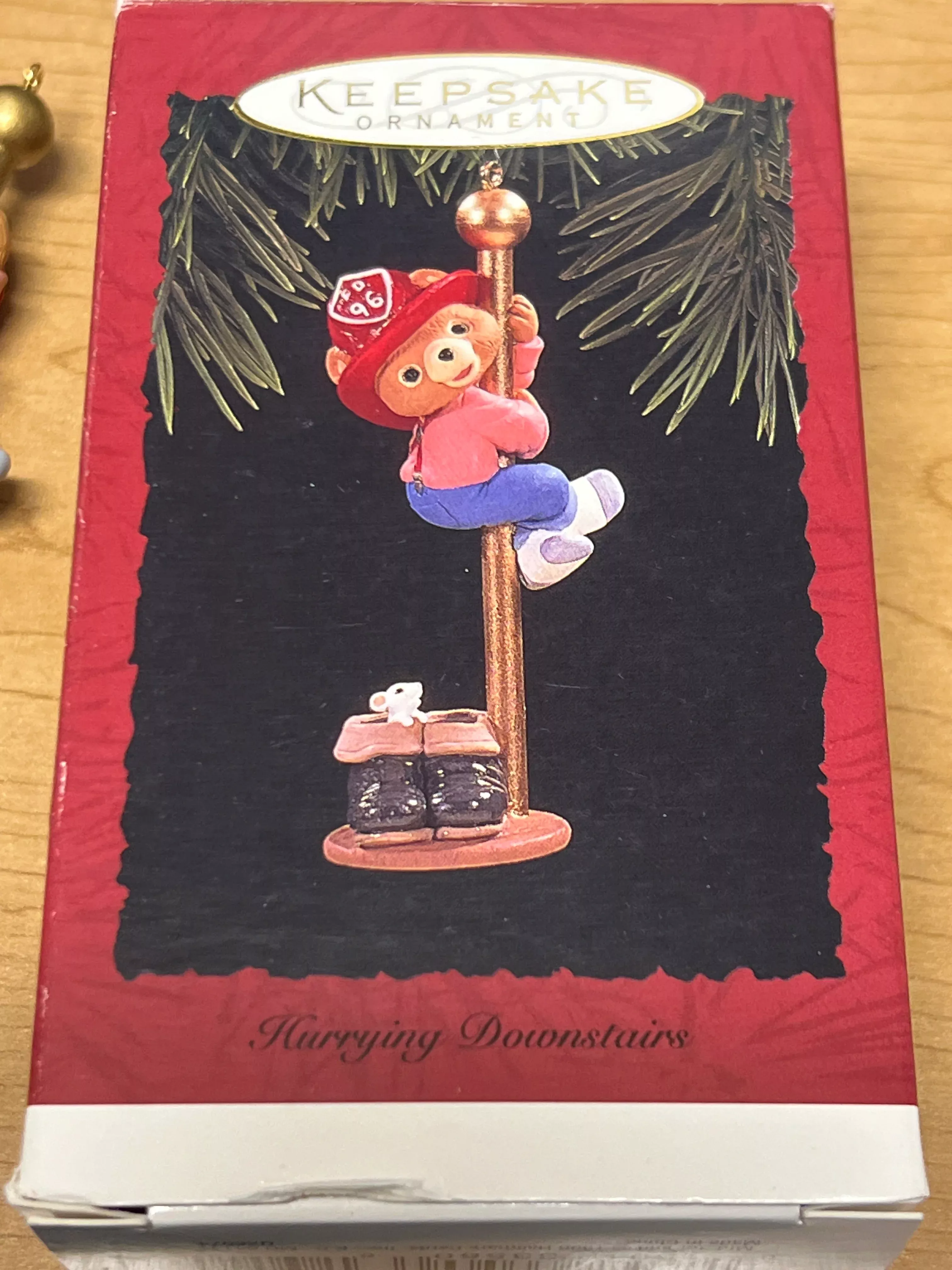 Hallmark 1996 Hurrying Downstairs Fire Fighter Ornament Like New